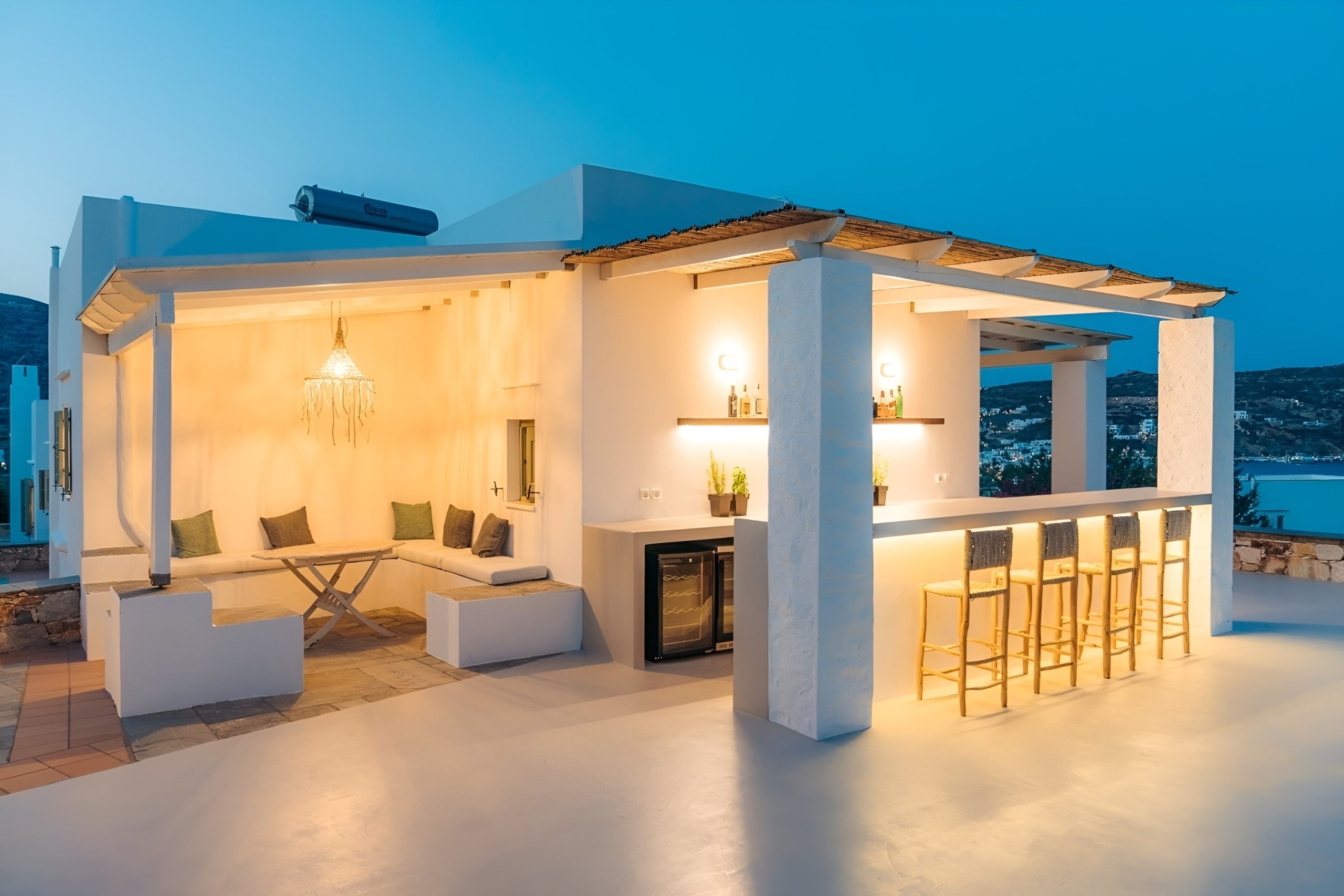 Pool dining area at Villa Olivia Clara by night
