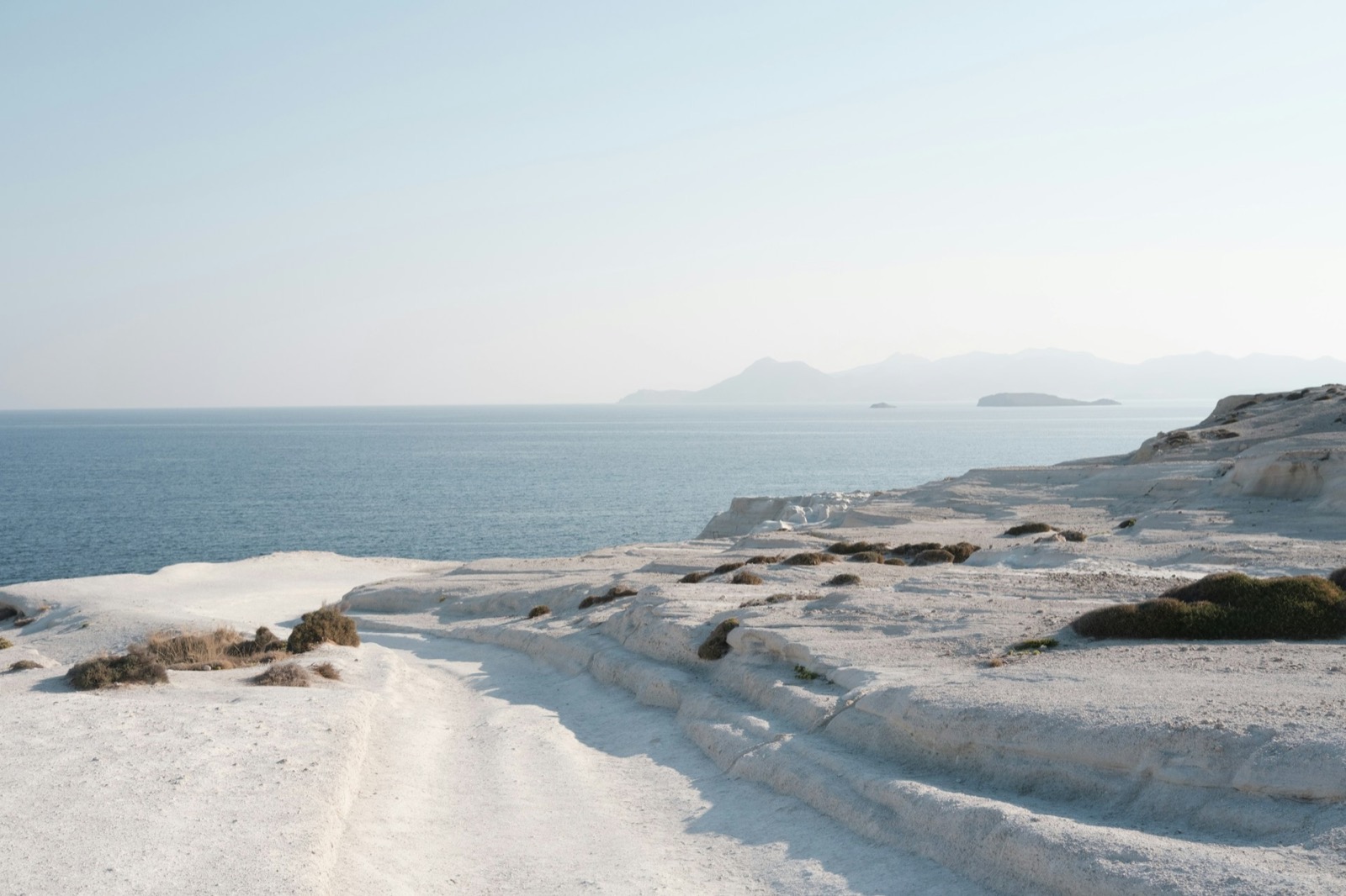 White volcanic cliffs and the Aegean Sea at Sarakiniko, Milos