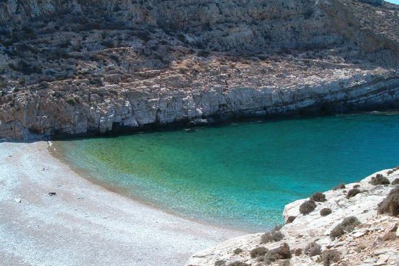Boat trip exploring Folegandros coastline and remote beaches